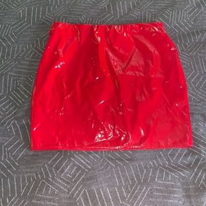 Red faux leather mini skirt
